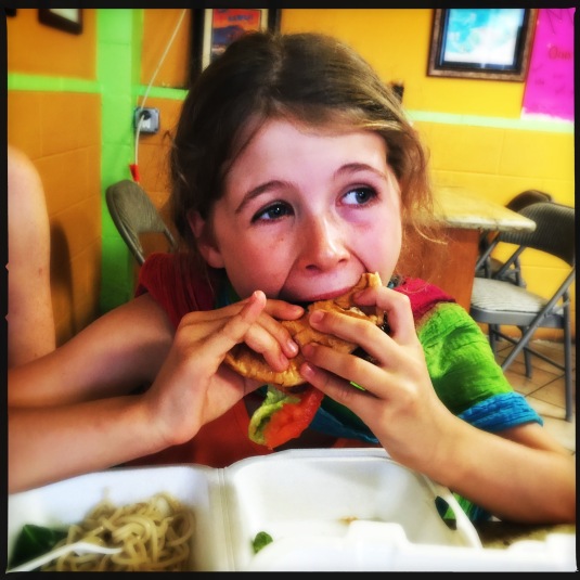 Willa likes her hamburger at Ono Steak and Shrimp